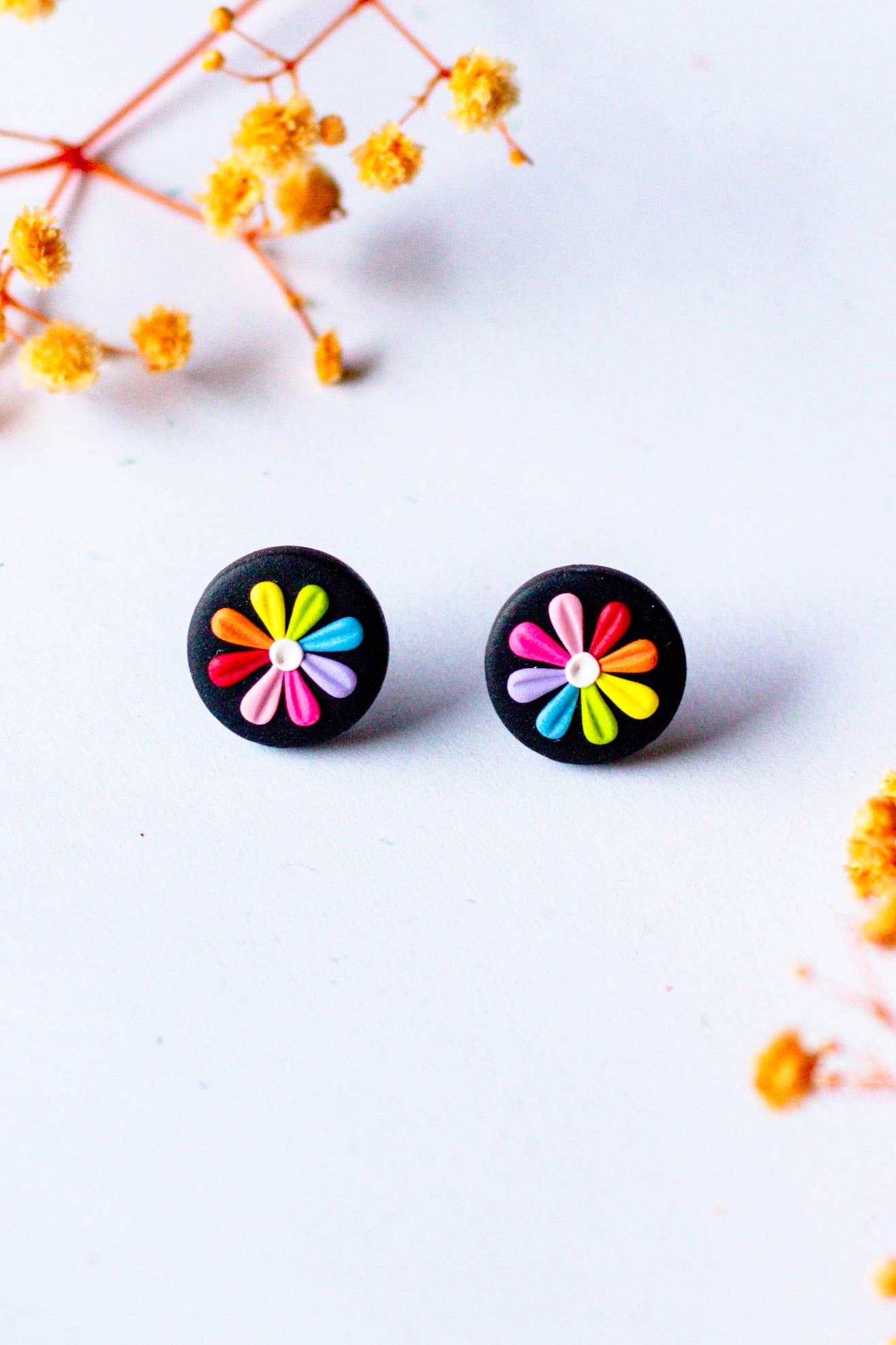 Slow Day Studios – wholesale Stud/post earrings – Small Rainbow Daisy Flower Black Polymer Clay Stud Earrings1