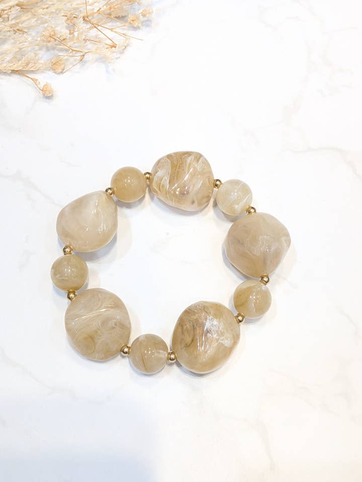 Resin bracelets in various stone shapes for wholesale by LOLO & YAYA