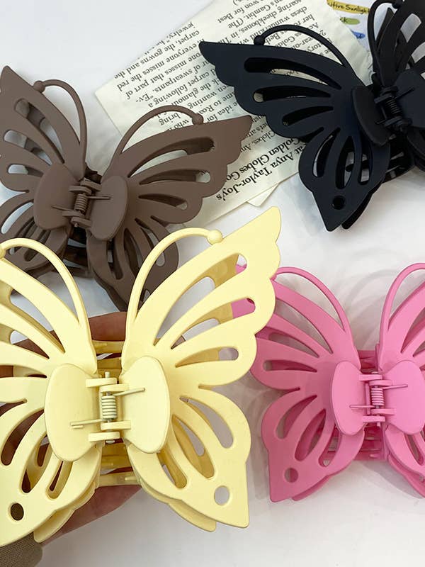 Grazioso artiglio per capelli a forma di farfalla per la vendita all'ingrosso da parte di Comely Fashion