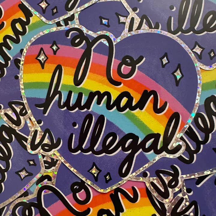 Hilarious Humanitarian - Wholesale Sticker - No Human Is Illegal Glitter Sticker