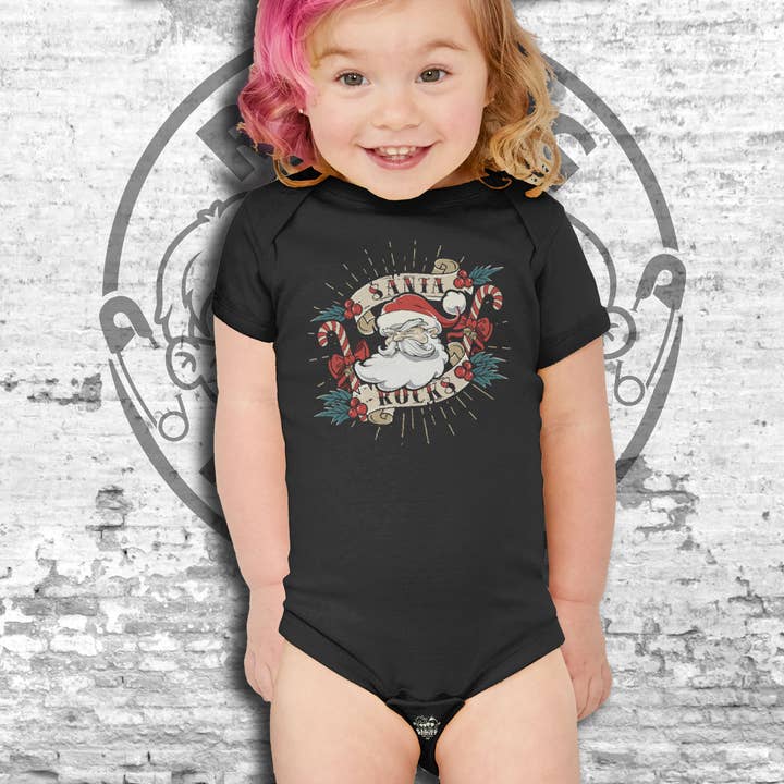 Christmas Santa Rocks Tattoo Infant Unisex S/S Bodysuit for wholesale by Raging Rascals