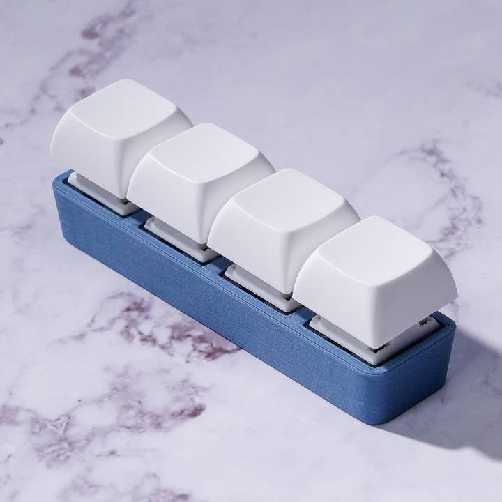 4 Key Silent Keyboard Fidget Keychain for wholesale by Strudel3D