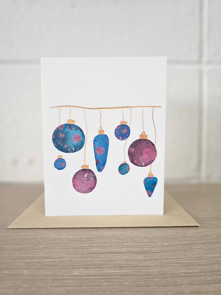 Christmas Ornaments Color Greeting Card for wholesale by Covered With Art