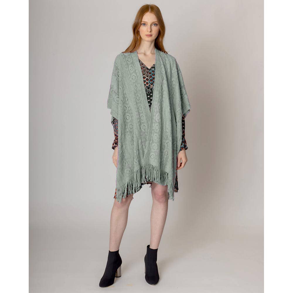 Sensibling Corp. - Vendita all'ingrosso Poncho - Donna - Poncho Ruana all'uncinetto solido0