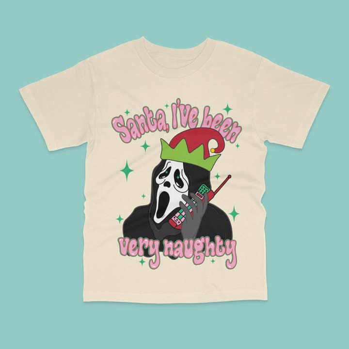 PJ AND CO - Venta al por mayor Camiseta estampada - Mujer - Camisa navideña de Ghostface Santa con texto en inglés «I've been Naughty»1