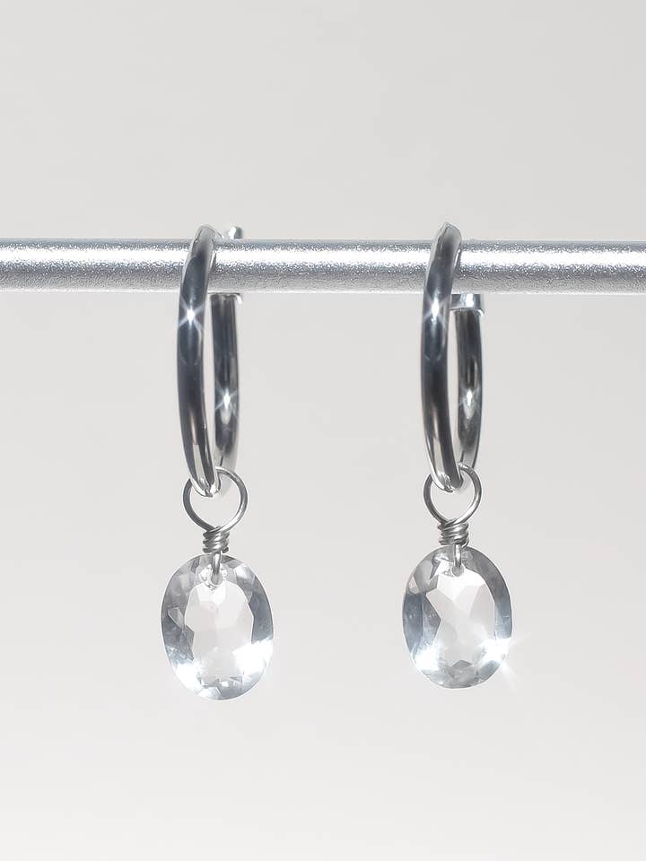 Rock Crystal Oval Cut Rhodium Hoop Earrings for wholesale by Iggi
