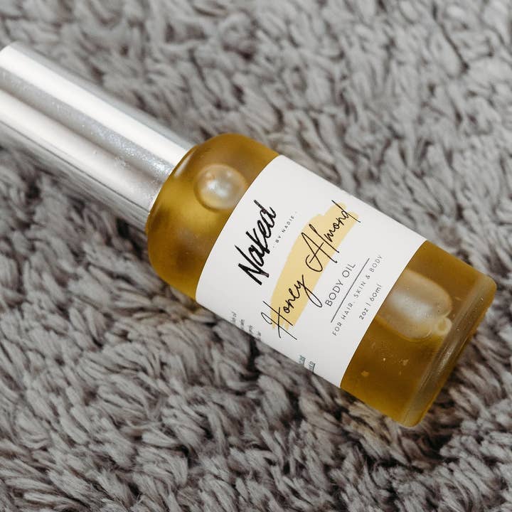 Huile corporelle au miel et aux amandes 2oz pour la vente par naked by nadie