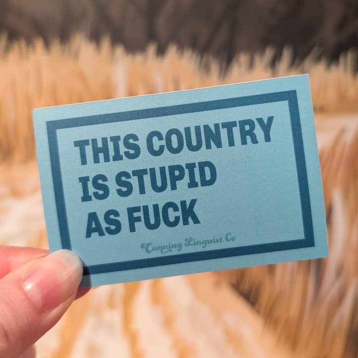 Stupid Country sticker for wholesale by Cunning Linguist Co.