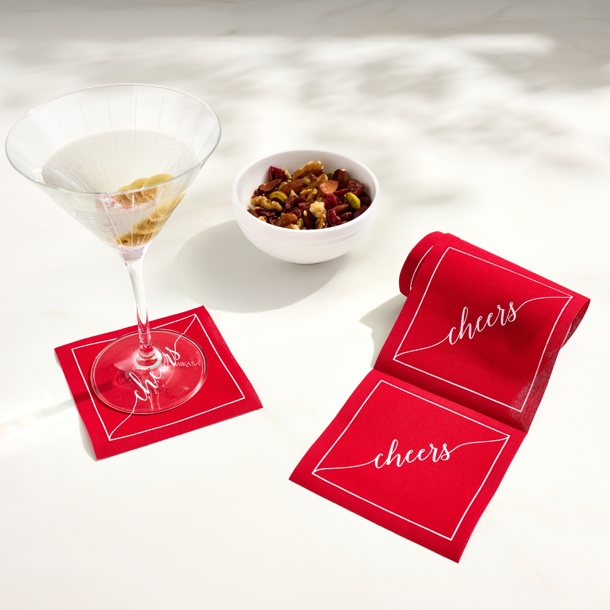 Table Theory (Formerly Toasting with Tara) - Wholesale Disposable Napkin - Cotton Cocktail Napkin Roll: The Red Carpet - White "Cheers"6