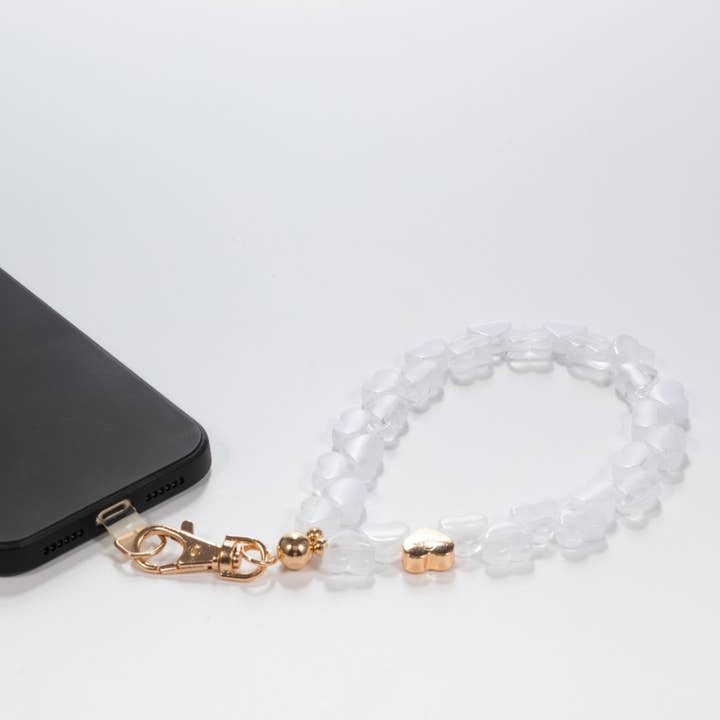 Pochette de téléphone à dragonne Cœurs de flocon de neige pour la vente par Miami Chains & Co.