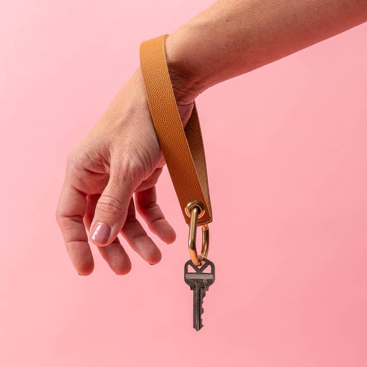 Sandy Tan Pebbled Leather Wristlet for wholesale by Avryn Co.