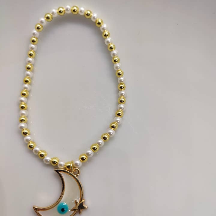 Gemscape UK – wholesale Vristlänk – Pärlstavad fotlänk med måne (guld och benvit) elastik - Smycken