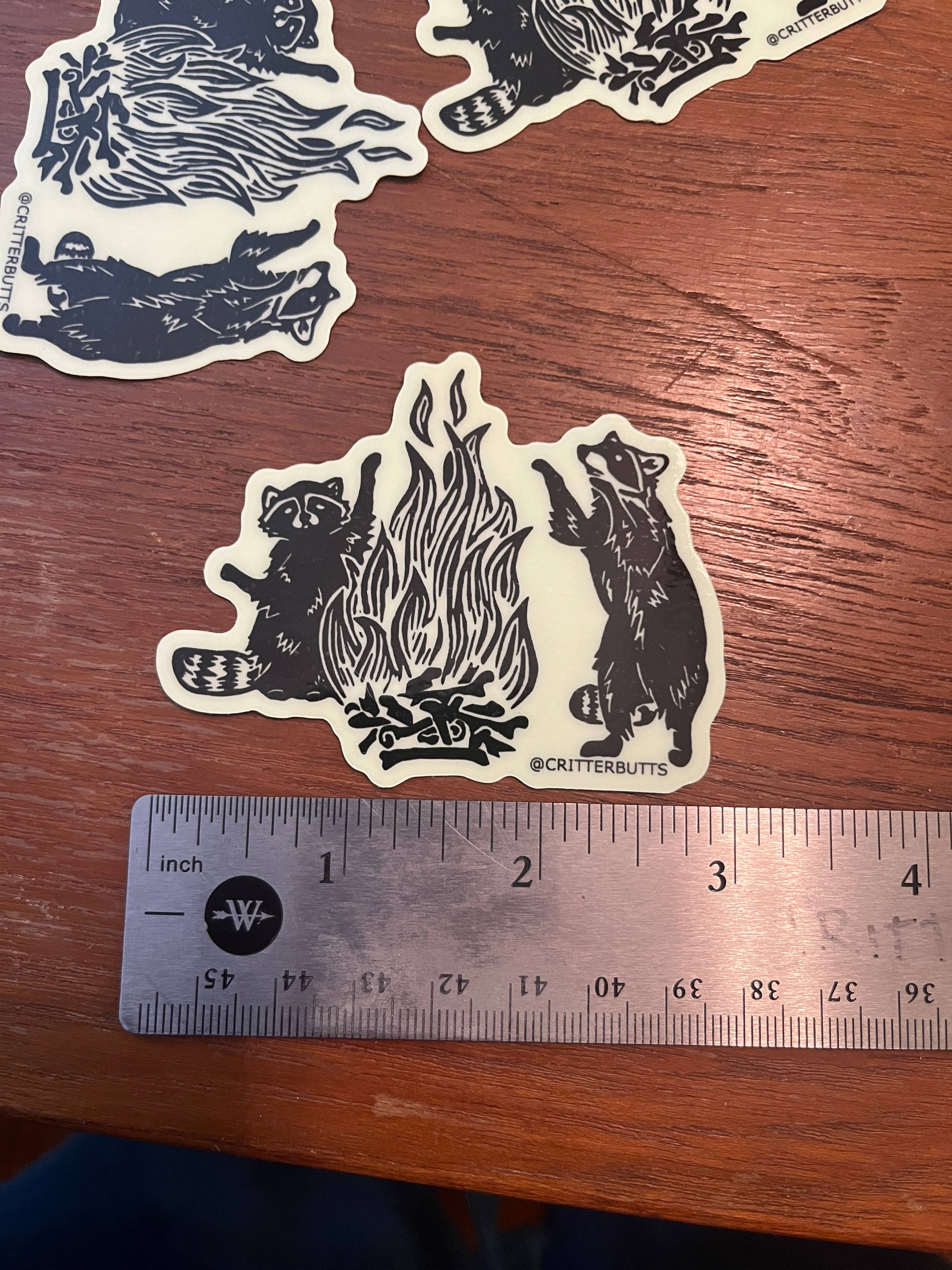 Critter Butts - Wholesale Phone & Laptop Stickers - Glow in the dark Raccoon Bonfire Sticker4