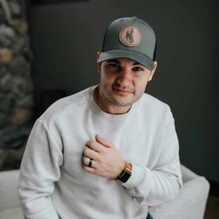 Range Leather Co. - Wholesale Trucker Hat - Unisex - Steamboat Hat - University of Wyoming Leather Patch Hat