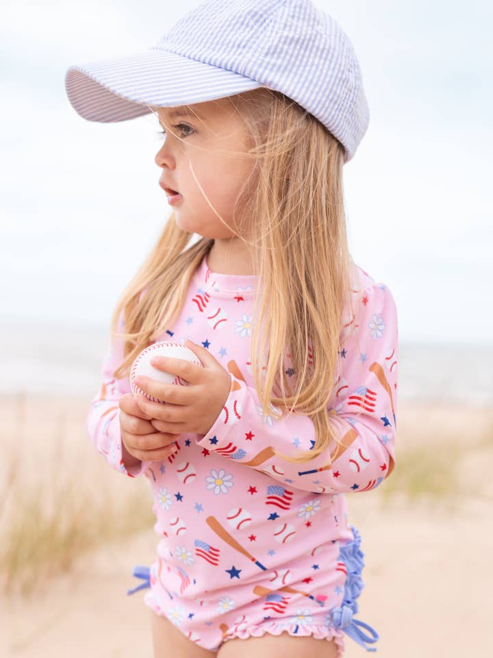 Baby Girls Pink Play Ball Long Sleeve One Piece Rash Guard Swimsuit with Signature Rear Ruffles
for wholesale on Faire