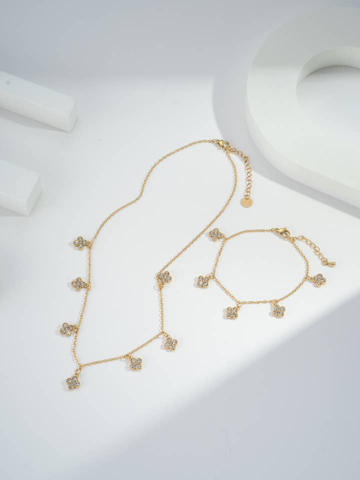 Parure collier bracelet Acier Inoxydable Fleurs Cristallines pour la vente par COSMOS