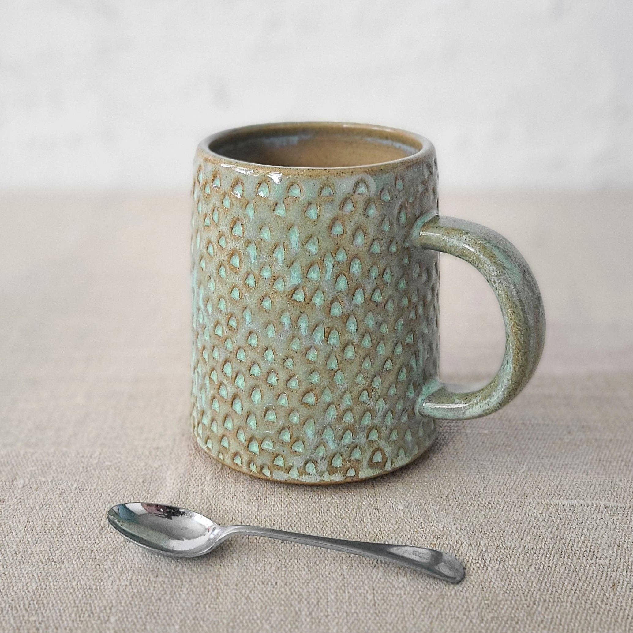 Katie L Thompson Designs – wholesale Coffee mug – Borealis Green Rustic Textured Pint Mug0