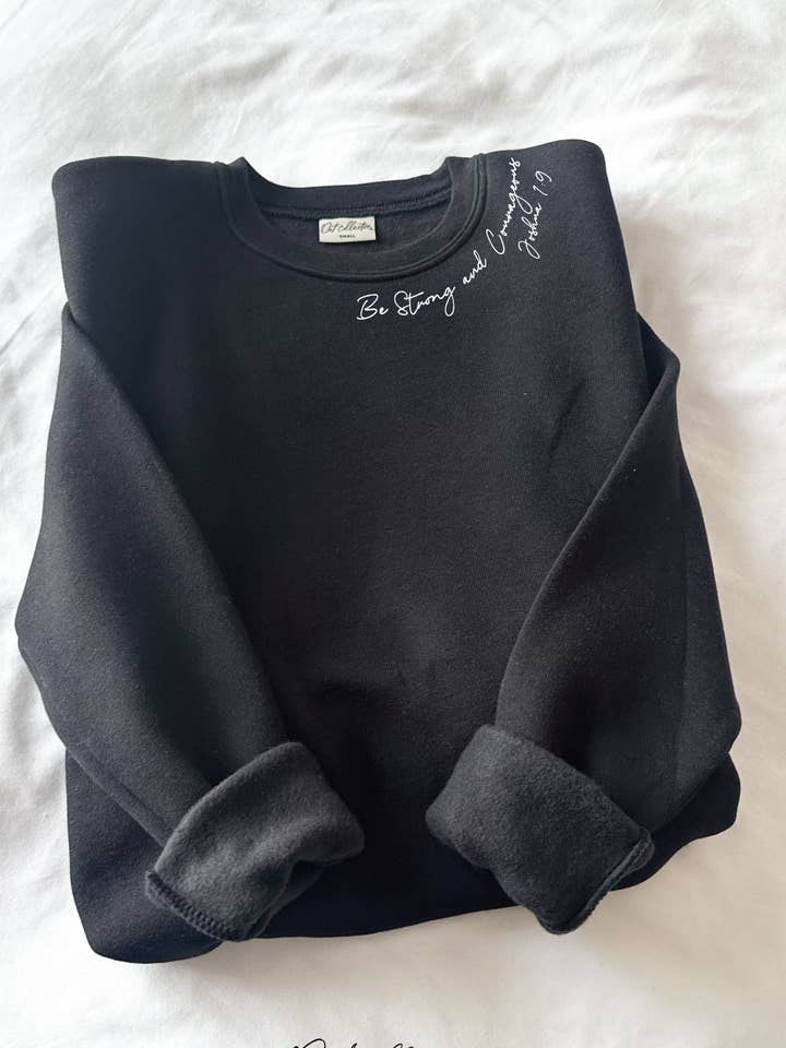 OAT COLLECTIVE - Wholesale Graphic Sweatshirt - Women's - BE STRONG AND COURAGEOUS Graphic Sweatshirt