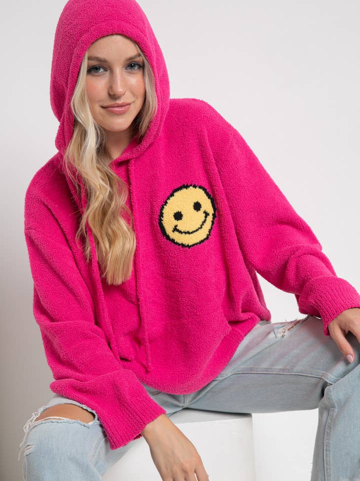 Pull à capuche douillet et pelucheux avec sourire pour la vente par Blue B