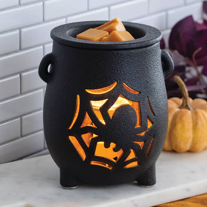 Chauffe-parfum à illumination de chaudron effrayant pour la vente par Candle Warmers Etc.