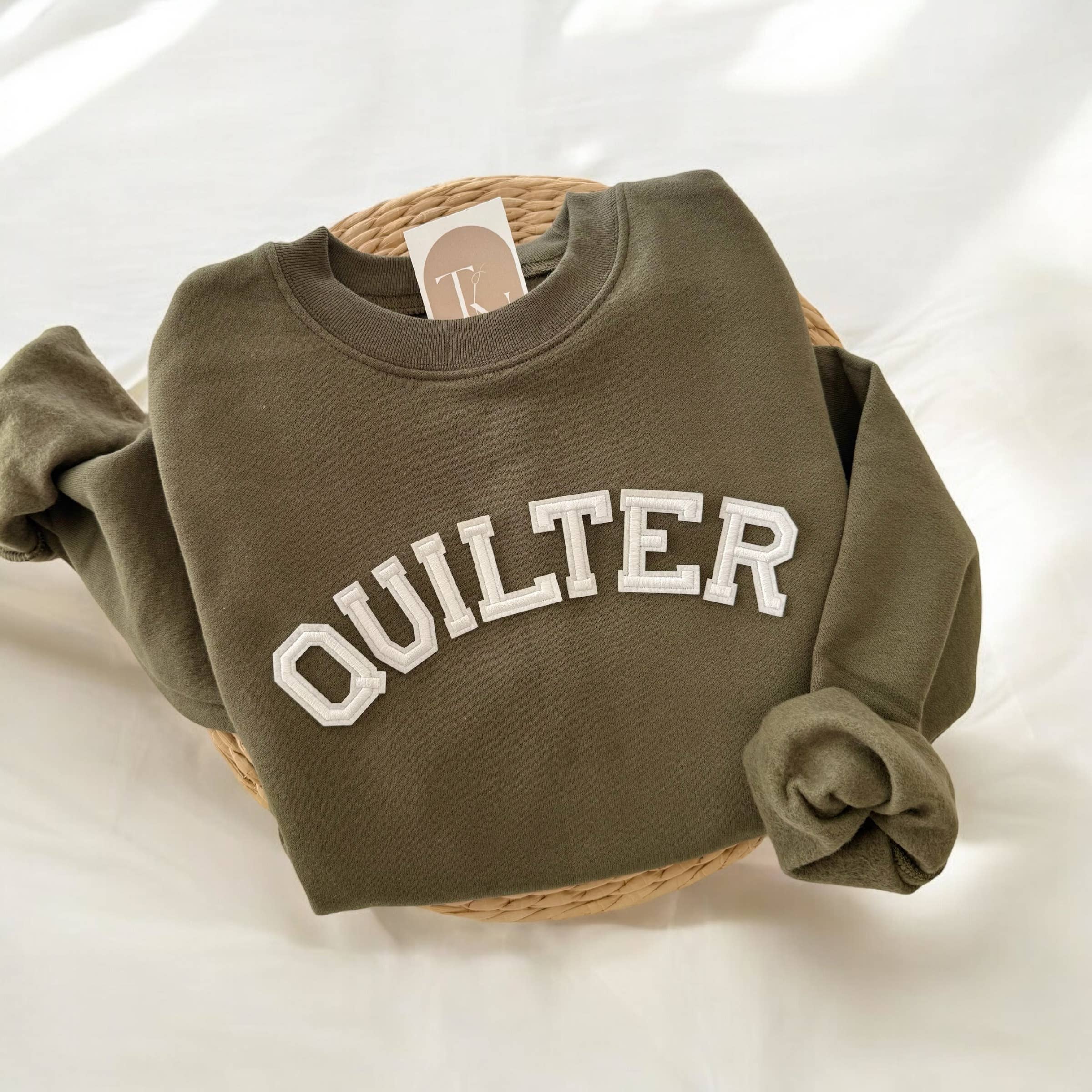 Threads And Needles, INC. - Venta al por mayor Sudadera estampada - Mujer - Sudadera QUILTER, Ropa de Acolchado1