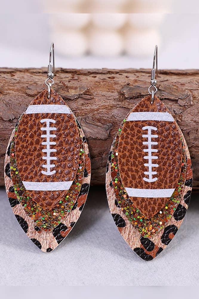 01 Brincos Leopardo e Futebol Impressos em PU MOQ 5pcs SP158 para venda a revendedores na Faire1