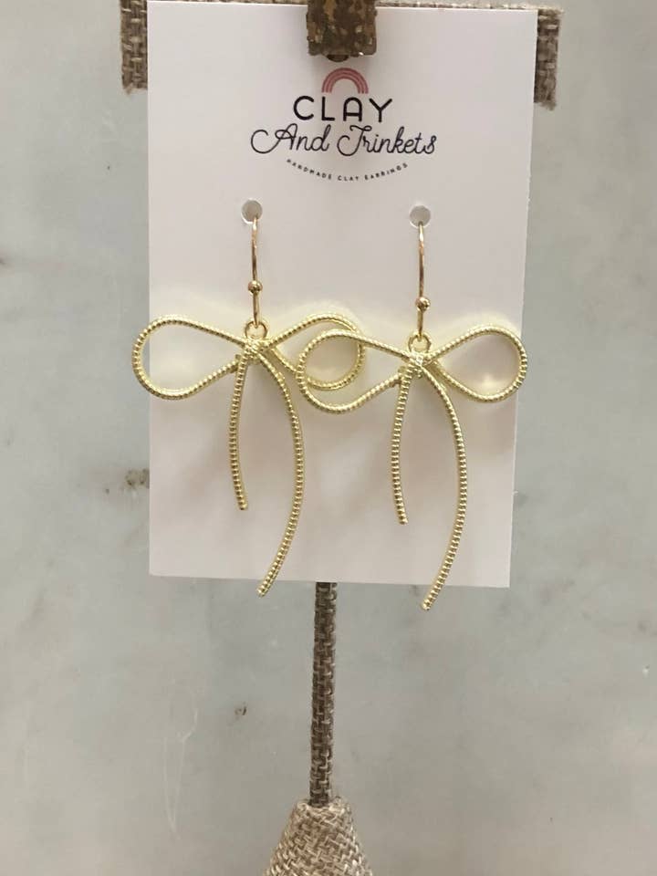 Textured Bow Dangle Earrings for wholesale by Clay and Trinkets