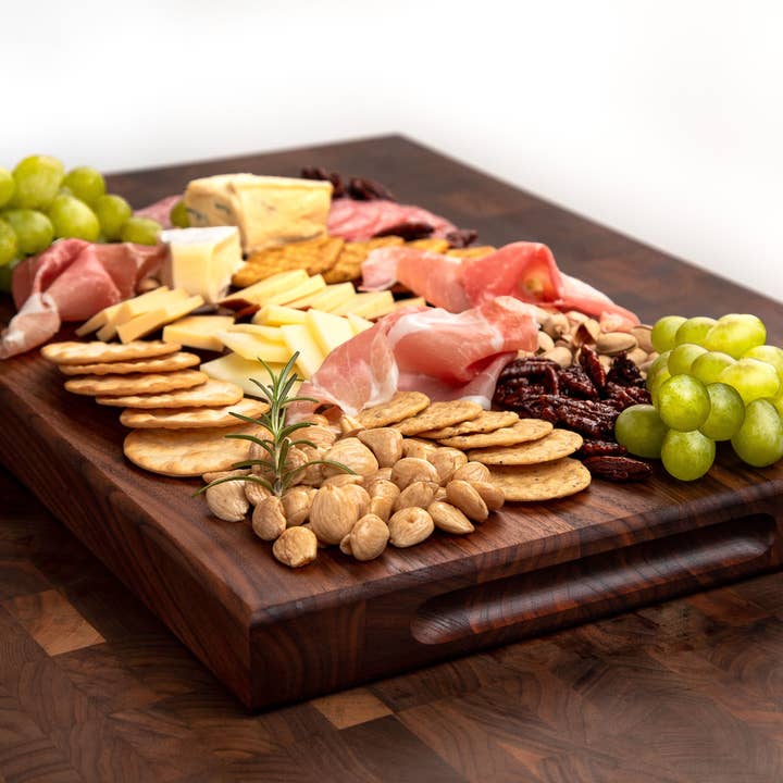 Kurouto Kitchenware - Wholesale Cheese board - Charcuterie Board- Black Walnut Edge Grain Meat and Cheese Serving Board- Reversible- Doubles as Butcher Block- with Juice Groove and Integrated Handles - (17 x 11 x 1.5 Inches)2
