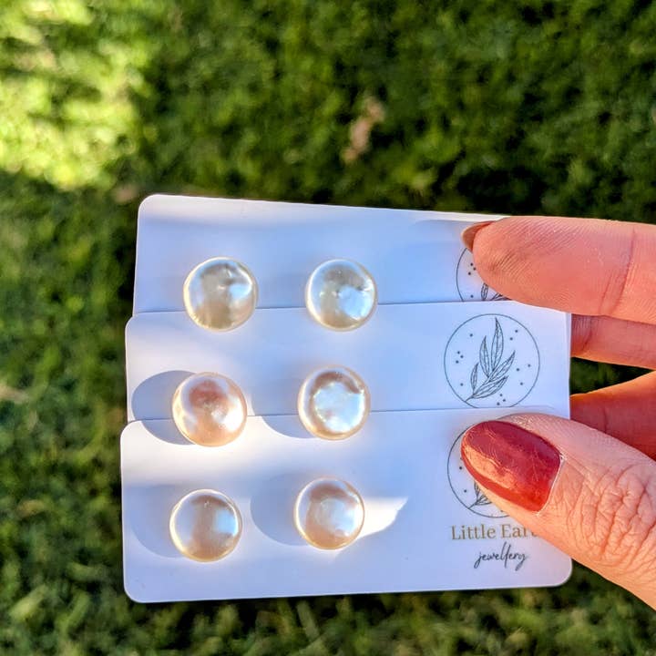 Coin Pearl Studs - Genuine Freshwater Pearl Stud Earrings and other Purchase Wholesale chocolate pirate coins. Free Returns & Net 60 Terms on Faire trending on Faire.