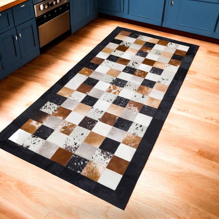 Multicolor Cowhide Patchwork Rug with Black Border, Hallway or Entryway Carpet for wholesale by Karelias And Sons