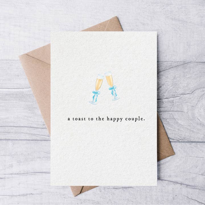 Un toast au couple heureux carte de fiançailles et de mariage pour la vente par la nouille studio