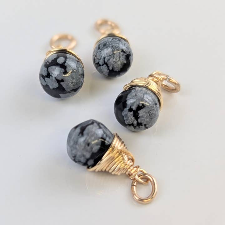 Unity Snowflake Obsidian Charms in Gold - Pack of 4 for wholesale by Forai