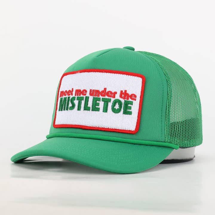Meet Me Under The Mistletoe Trucker Hat in Green for wholesale on Faire3