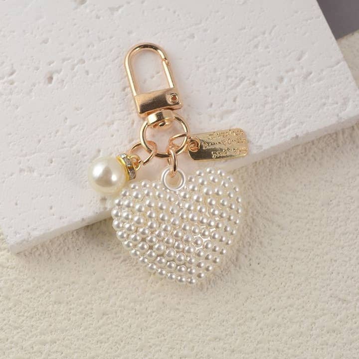 Gold PUFFY PEARL HEART KEYCHAIN BAG CHARM | 40KC131 for wholesale on Faire