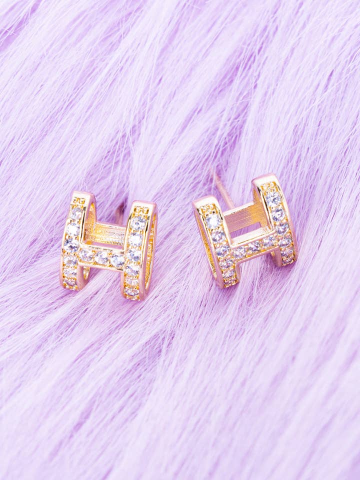 Shiny Luxe Prestige Pass Crystal Goldtone Earrings for wholesale by Wholesale Accessory Market