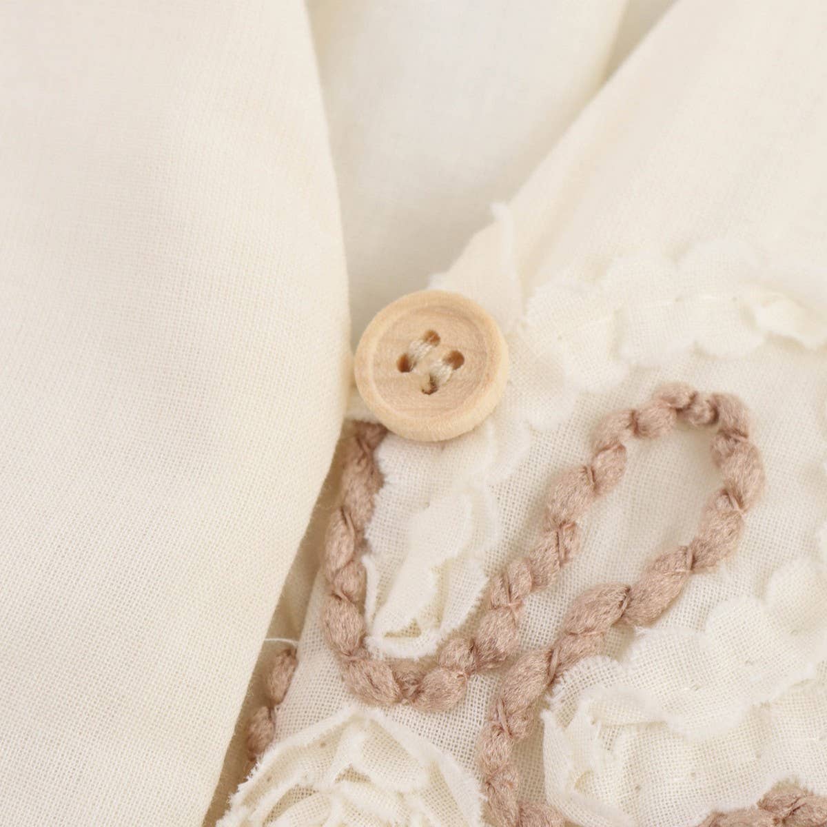 Beige Floral Embroidery MiniDress with Drawstring Cutout_CWDSD8316 for wholesale on Faire6