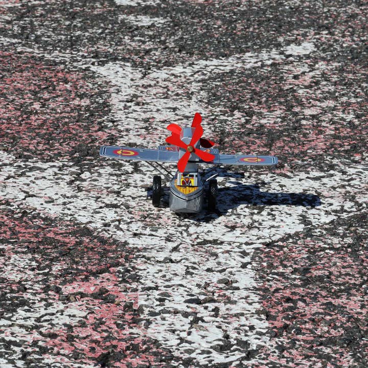 Tribal Trade GmbH - Wholesale Decorative Figurine - Tin toy airplane with double propeller tin airplane10