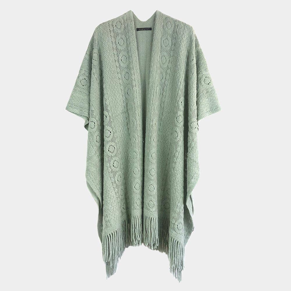 Sensibling Corp. - Vendita all'ingrosso Poncho - Donna - Poncho Ruana all'uncinetto solido1