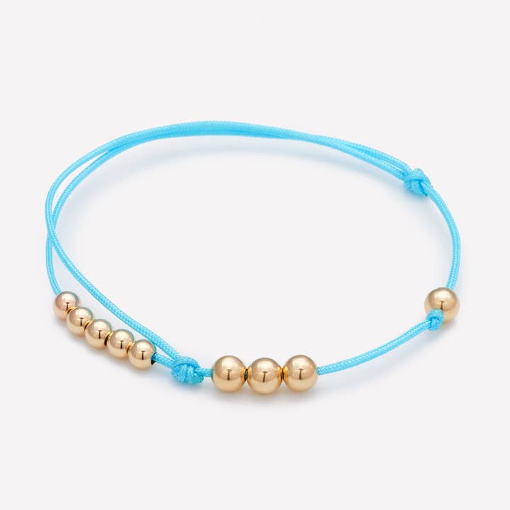 PULSEIRA MISHA DE CORDÃO TURQUESA por atacado de 22 Jewelry