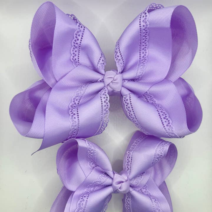 Purple Eyelet Bow for wholesale by Luminous Sky Bowtique