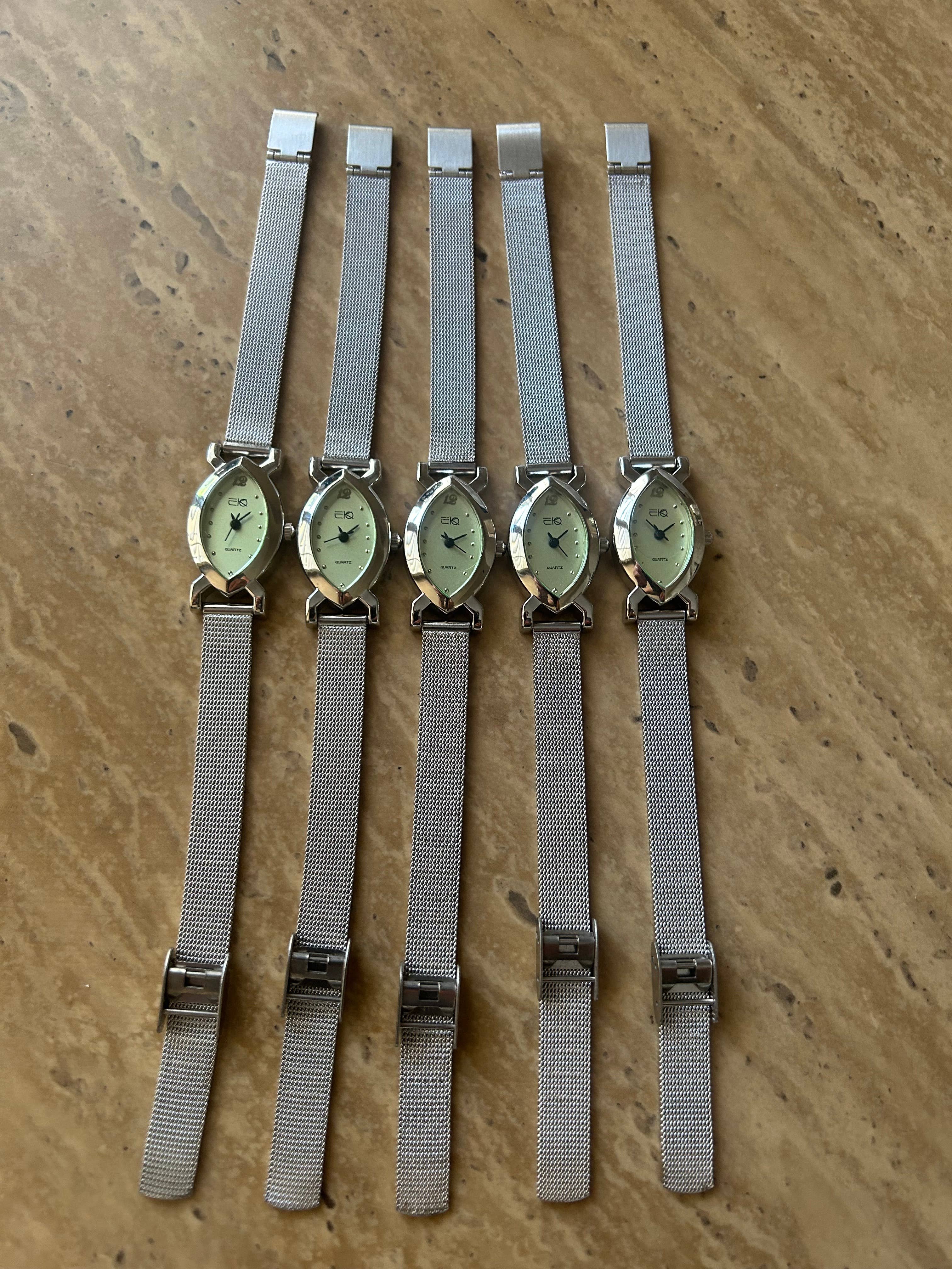 Siman International Inc. – Großhandel Armbanduhr – Damen – Ovale EKO-Armbanduhr für Damen mit weichem silbernem Netzband 2