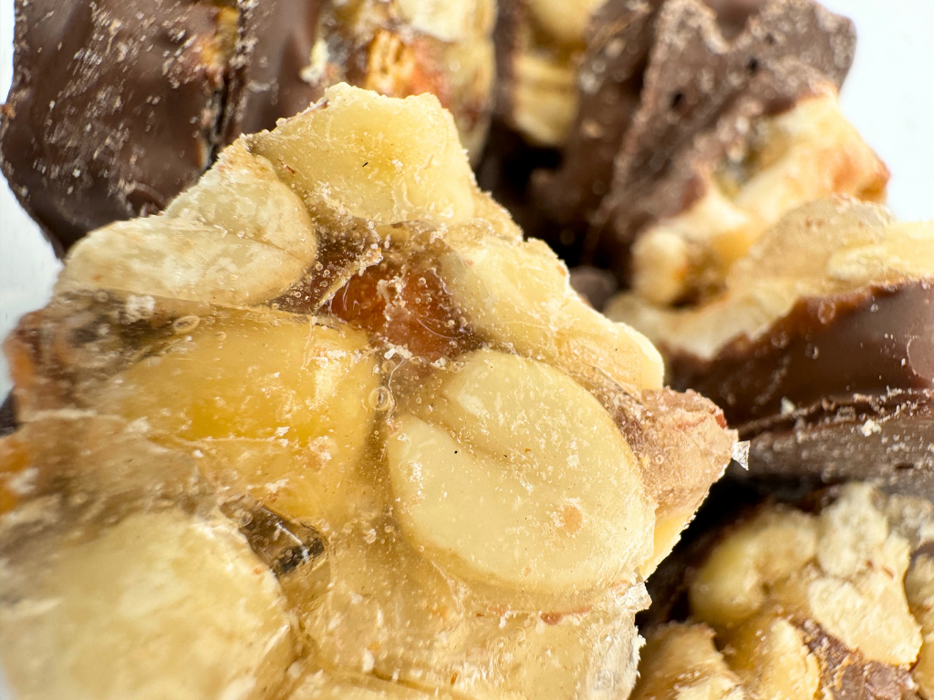 Martin's Country Store LLC – wholesale Chocolate-covered sweets – HALF DIPPED PEANUT SQUARES 9.6oz1