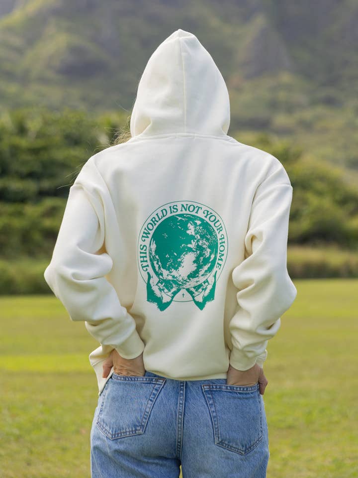 Den här världen är inte ditt hem Unisex Hoodie för wholesale av Elevated Faith