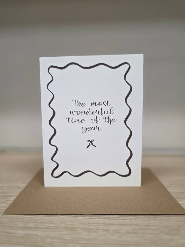 Most Wonderful Time of Year Bow Christmas Greeting Card for wholesale by Covered With Art