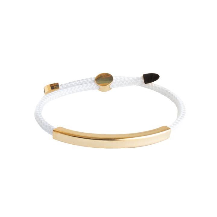 Algarves - Bracelet blanc avec attache barre en or pour la vente par Stolen Riches