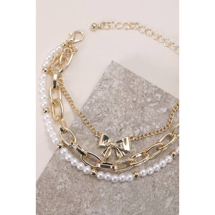 GOLD BOW PEARL LINK TRIO SET BRACELETS | 80B146 for wholesale on Faire