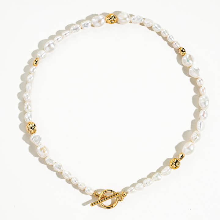 Penelope 18K Gold Natural Baroque Pearl Choker for wholesale on Faire1