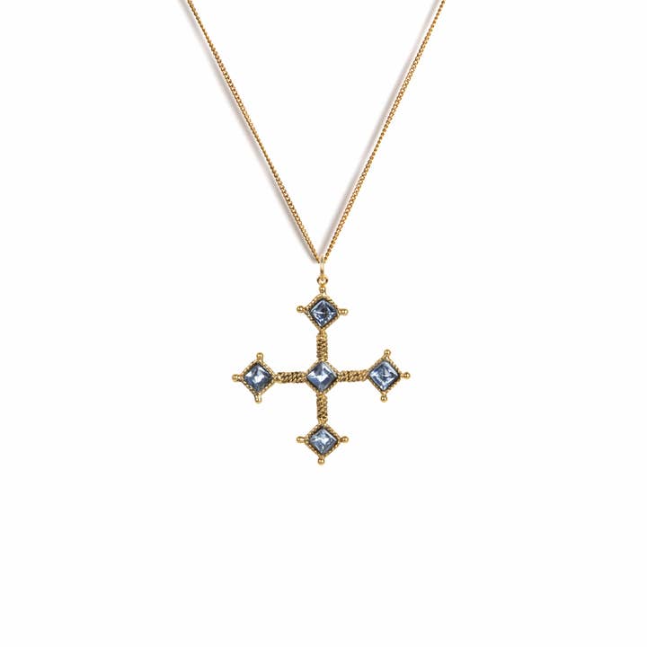 Brigid Cross Charm Necklace Water Lt Sapphire - Gold for wholesale by VSA Designs Inc.
