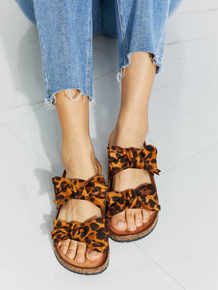 Forever Link Fiercely Feminine Leopard Bow Slide Sandals for wholesale by Beyond Apparel