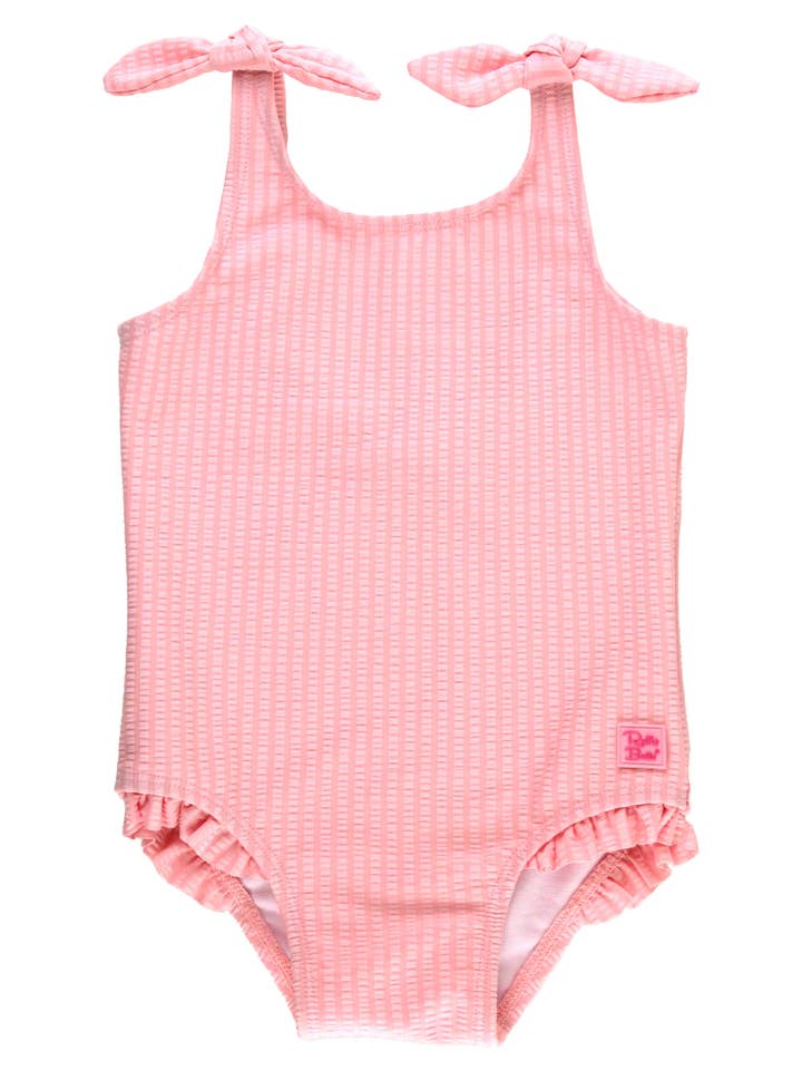 Maillot de bain une pièce rose à bretelles nouées pour filles pour la vente par RuffleButts + RuggedButts